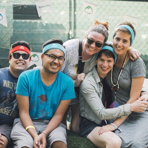 a group of people wearing headbands
