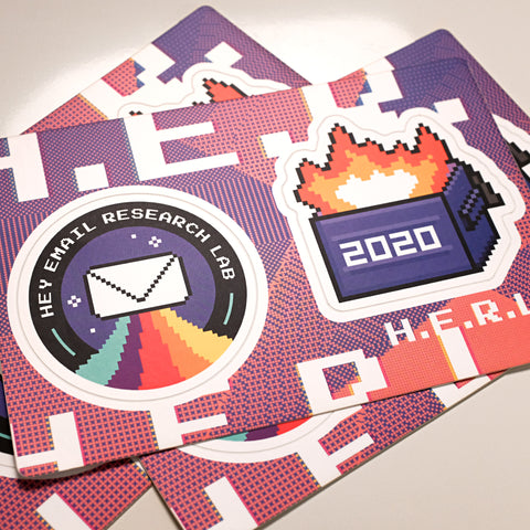 a stack of H.E.R.L. sticker sheets