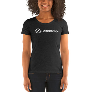 a woman wearing a black tee with the Basecamp logo on it
